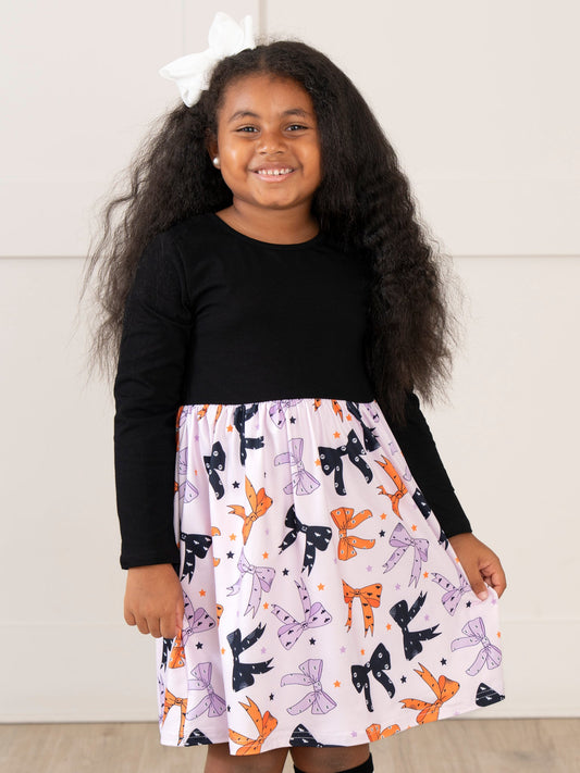 Plum Perfect Bow Ruffle Dress
